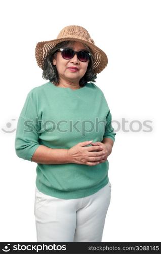 Portrait of happy asian senior woman wearing sunglasses and a hat standing isolated on white background. Concept of tourist enjoy and fun valentine day after retire, retirement lifestyle