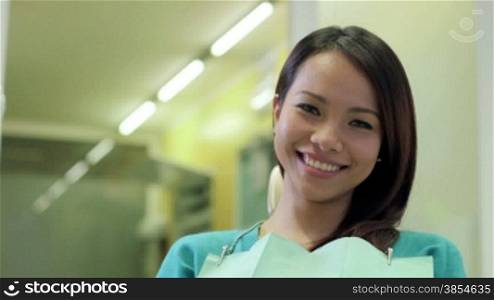 Portrait of happy asian woman as patient smiling in dentist studio, people and oral hygiene, health care in clinic. 12of19