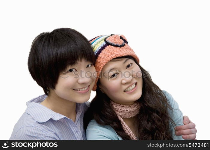 Portrait of happy brother and sister over white background