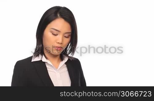 Portrait of happy business woman calling by cellular phone
