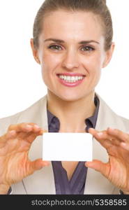 Portrait of happy business woman showing business card