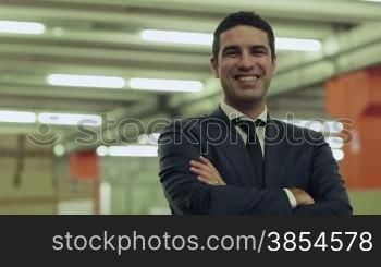 Portrait of happy businessman employed in logistics facility smiling at camera, people working in warehouse, workers in industry. 14of19