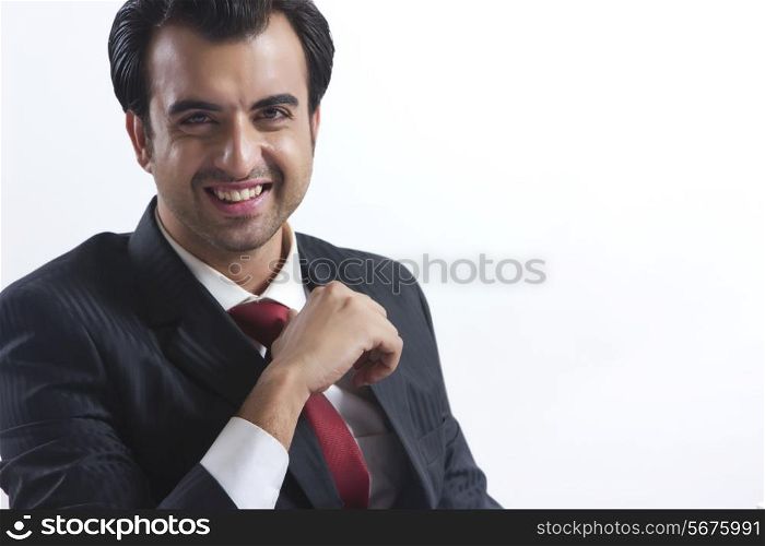 Portrait of happy businessman over white background