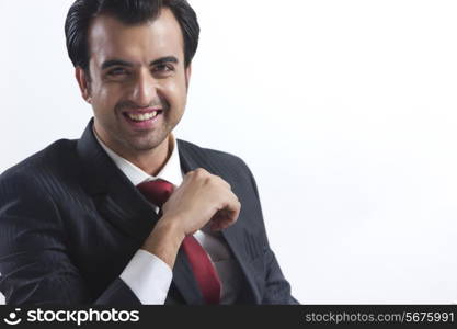 Portrait of happy businessman over white background