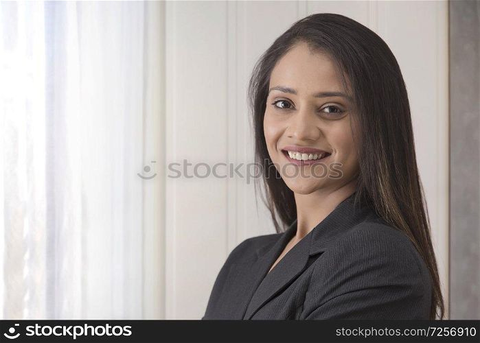 portrait of happy businesswoman in office