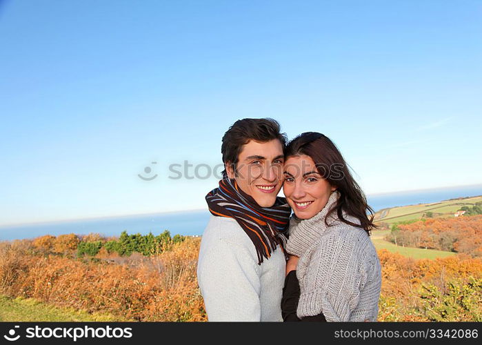 Portrait of happy couple in fall season