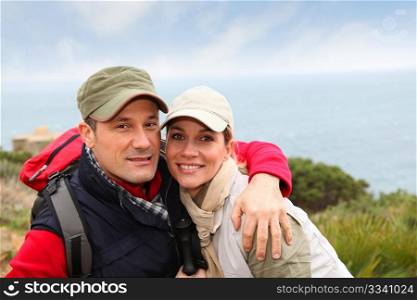 Portrait of happy couple on hiking day