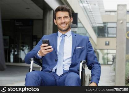portrait of happy disabled man on wheelchair