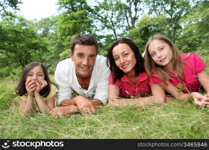 Portrait of happy family in countryside