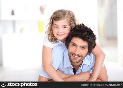 portrait of happy father and daughter