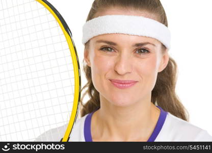 Portrait of happy female tennis player