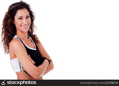 portrait of happy fitness woman with his hands folded on isolated white background