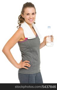 Portrait of happy fitness young woman with bottle of water