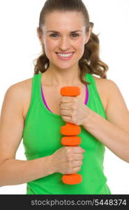 Portrait of happy fitness young woman with dumbbells