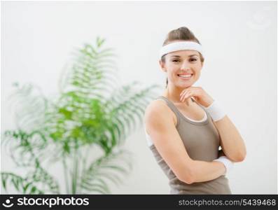Portrait of happy healthy woman in sportswear