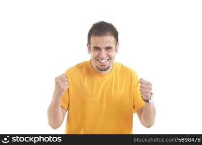 Portrait of happy Indian young man cheering with clenched fists isolated over white background