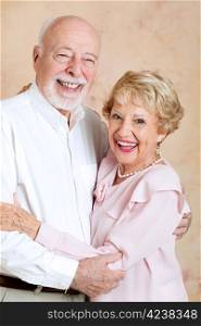 Portrait of happy, laughing senior couple, still in love after many years.
