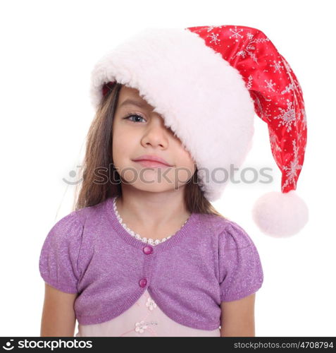 Portrait of happy little girl in Santa hat isolated on white background