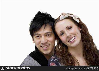 Portrait of happy loving couple over white background