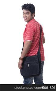Portrait of happy male student with bag against white background