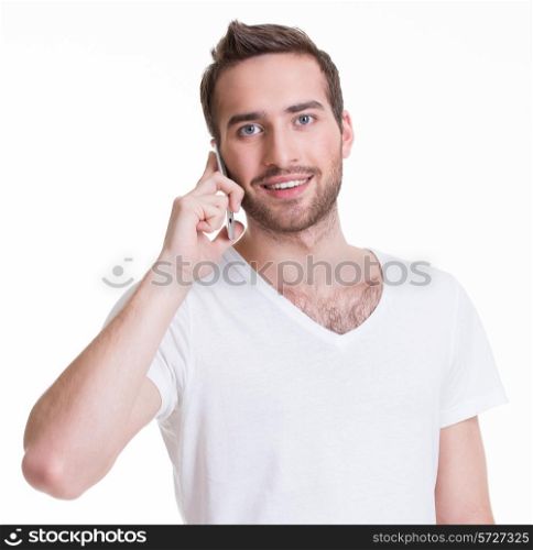 Portrait of happy man calling by mobile in casuals - isolated on white. Concept communication.&#xA;