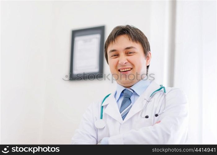 Portrait of happy medical doctor