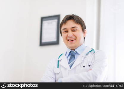 Portrait of happy medical doctor