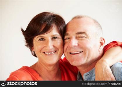 Portrait Of Happy Middle Aged Hispanic Couple