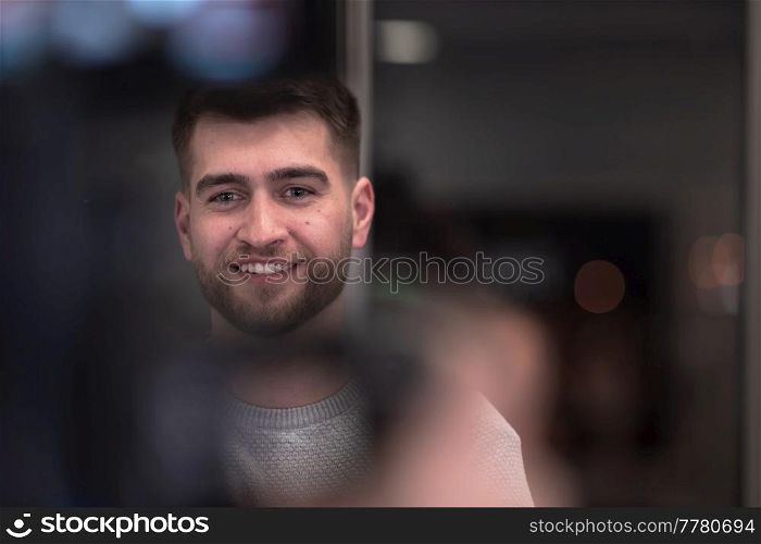 Portrait of happy millennial male business owner in modern office. Businessman, smiling and looking at camera. Leadership concept. Head shot. High-quality photo. Portrait of happy millennial male business owner in modern office. Businessman, smiling and looking at camera. Leadership concept. Head shot.
