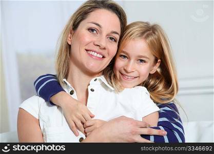 Portrait of happy mother and little girl