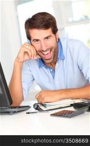 Portrait of happy office worker