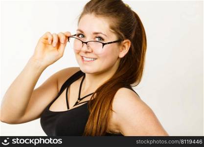 Portrait of happy positive business woman or student girl wearing eyeglasses, enjoying her work, college.. Happy positive business woman or student