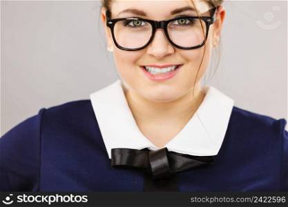 Portrait of happy positive business woman wearing eyeglasses, accountant or teacher, enjoying her work.. Happy positive business woman, accountant