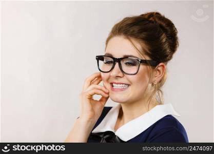 Portrait of happy positive business woman wearing eyeglasses, accountant or teacher, enjoying her work.. Happy positive business woman, accountant