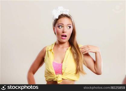 Portrait of happy pretty pin up girl with bow.. Portrait of happy smiling pretty pin up girl with hairband bow. Attractive gorgeous young retro woman posing in studio.