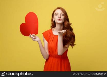 Portrait of happy romantic young caucasian girl with red paper heart-shaped postcard, romantic wishes, Valentine day celebration, love concept.. Portrait of happy romantic young caucasian girl with red paper heart-shaped postcard, romantic wishes, Valentine day celebration, love concept