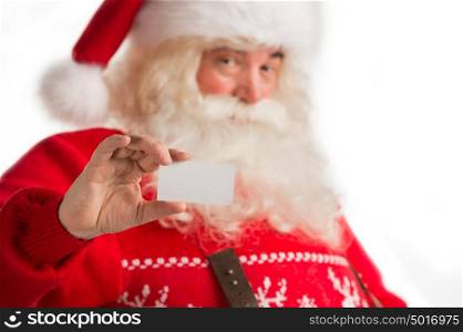 Portrait of happy Santa Claus showing blank business card isolated on white background. Call Santa Concept