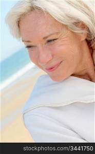 Portrait of happy senior woman in spa resort