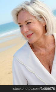 Portrait of happy senior woman in spa resort