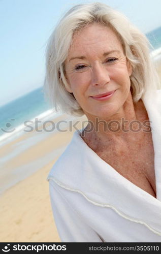 Portrait of happy senior woman in spa resort