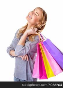 Portrait of happy shopper girl with closed eyes isolated on white background, enjoying shopping, sales season, making purchase, spending money concept