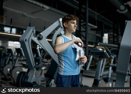 Portrait of happy smiling teenager boy feeling satisfied after good training workout at gym. Portrait of teenager boy feeling satisfied after good training at gym