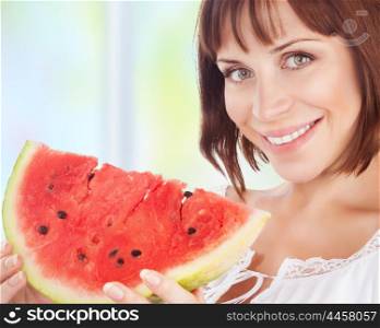 Portrait of happy smiling woman eat fresh red ripe watermelon at home, enjoying summer fruits, organic food, healthy natural dessert