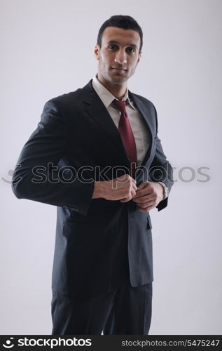 Portrait of happy smiling young arab business man isolated on white background