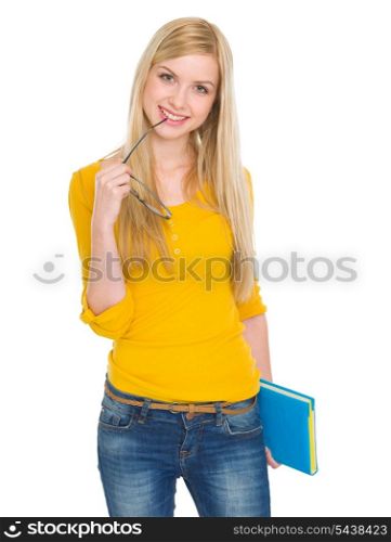 Portrait of happy student girl with book and glasses