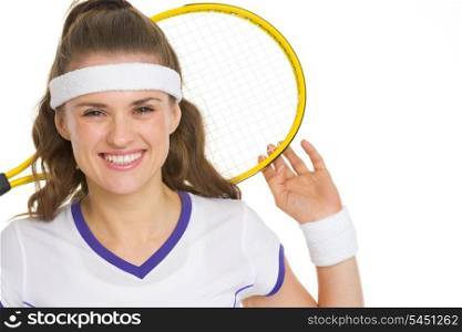 Portrait of happy tennis player holding racket