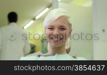 Portrait of happy woman as client smiling in dentist studio, people and oral hygiene, health care in hospital. 14of19
