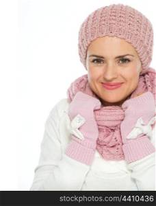 Portrait of happy woman in knit scarf, hat and mittens