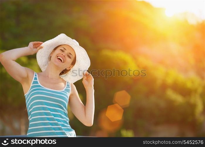 Portrait of happy woman on vacation