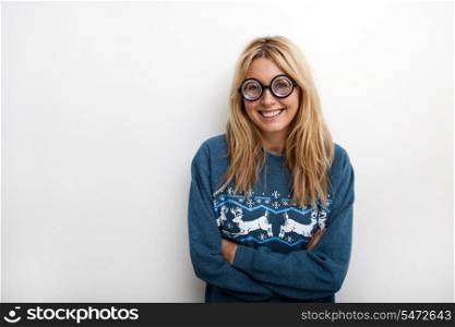 Portrait of happy woman wearing eyeglasses against white background